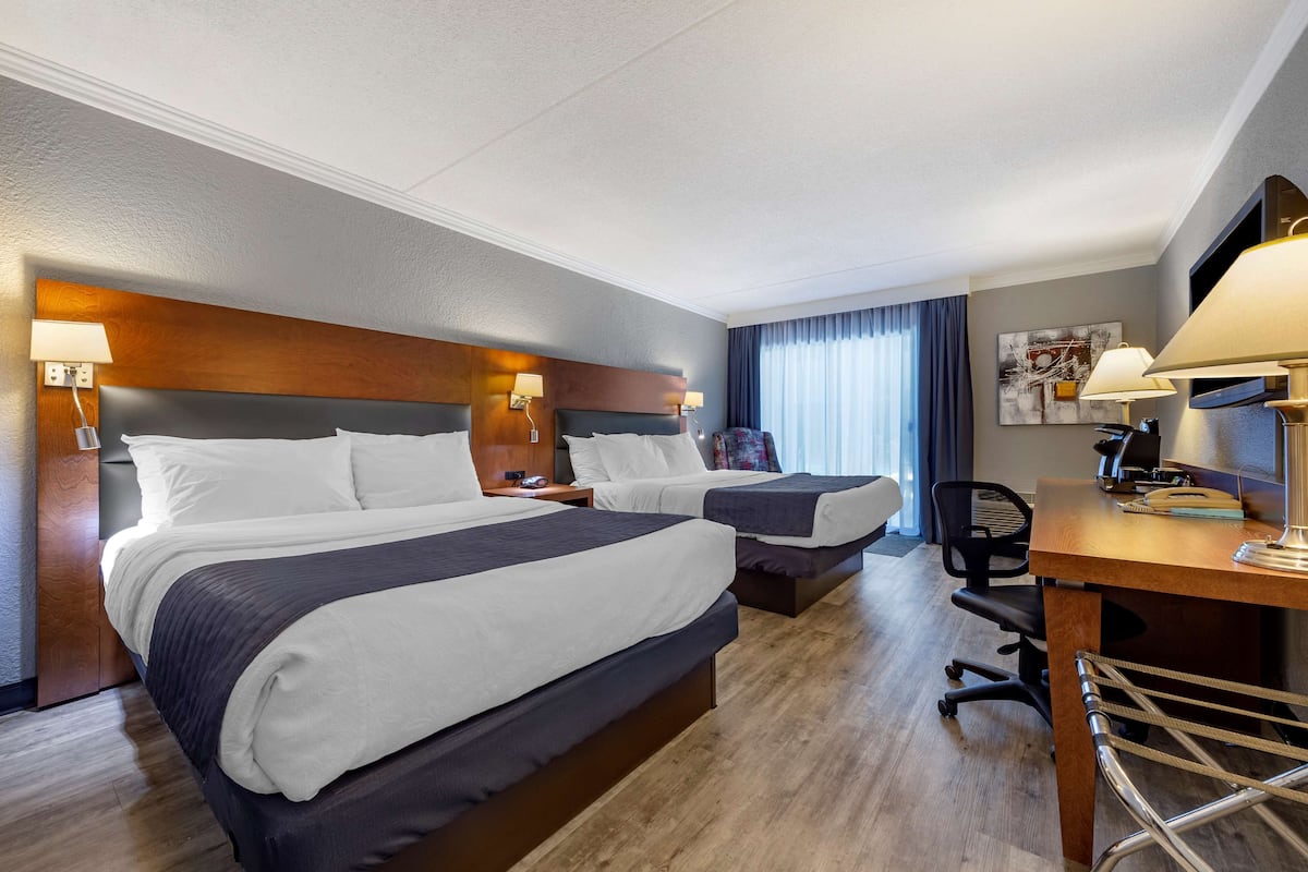 Memory foam beds, desk, laptop workspace, blackout drapes