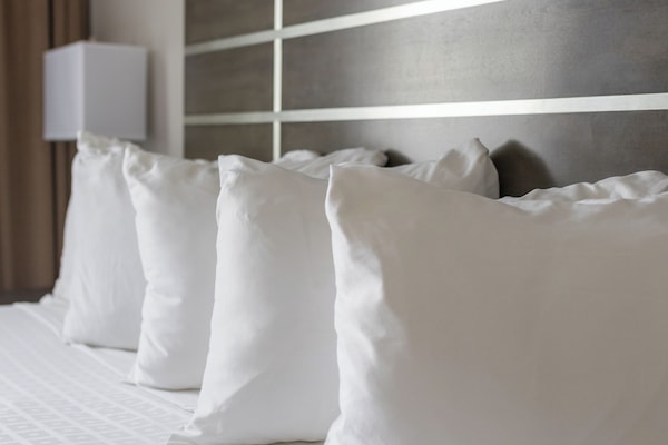 Premium bedding, down duvets, desk, laptop workspace