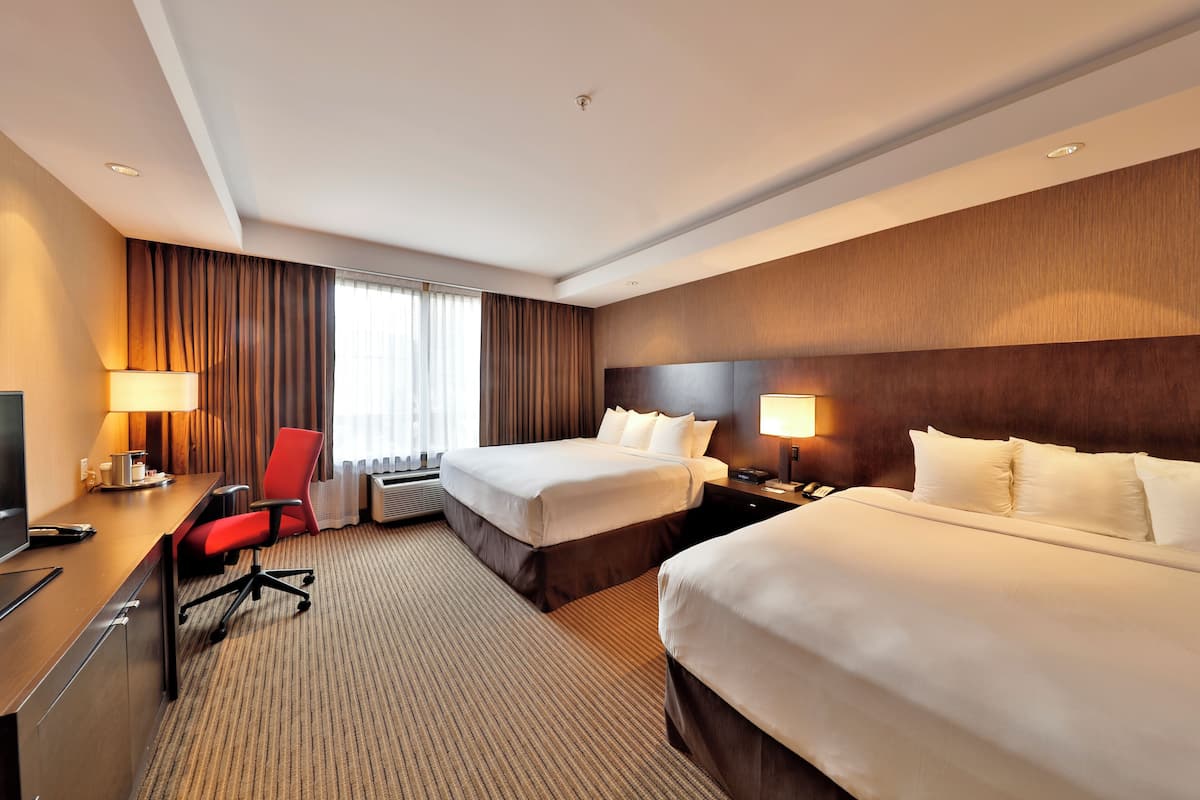 Premium Room, Multiple Beds | 1 bedroom, desk, laptop workspace, blackout drapes