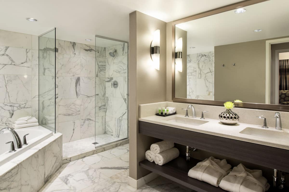 executive suite | bathroom | eco-friendly toiletries, hair dryer, towels