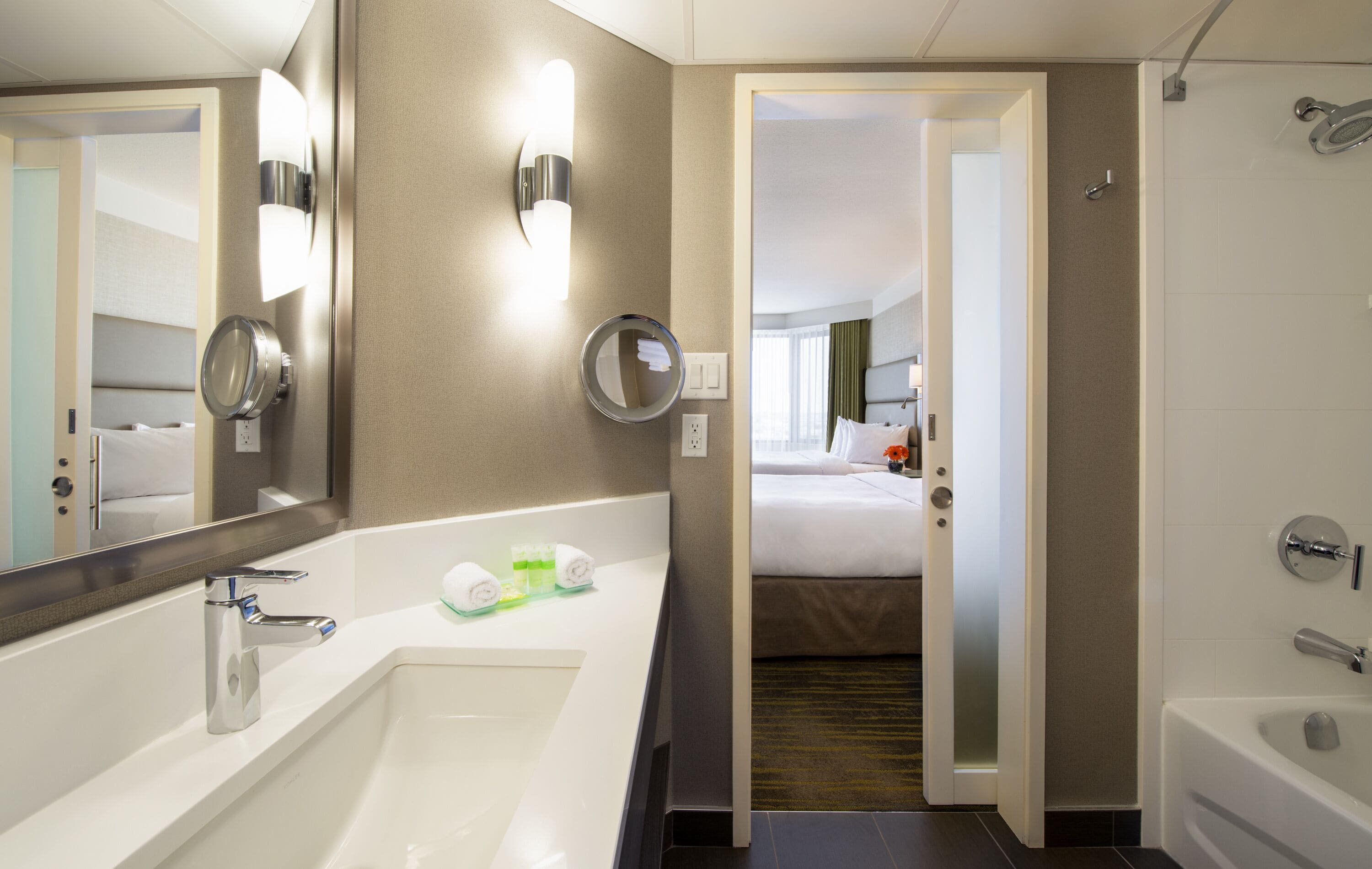 standard room, 2 queen beds | bathroom | eco-friendly toiletries, hair dryer, towels