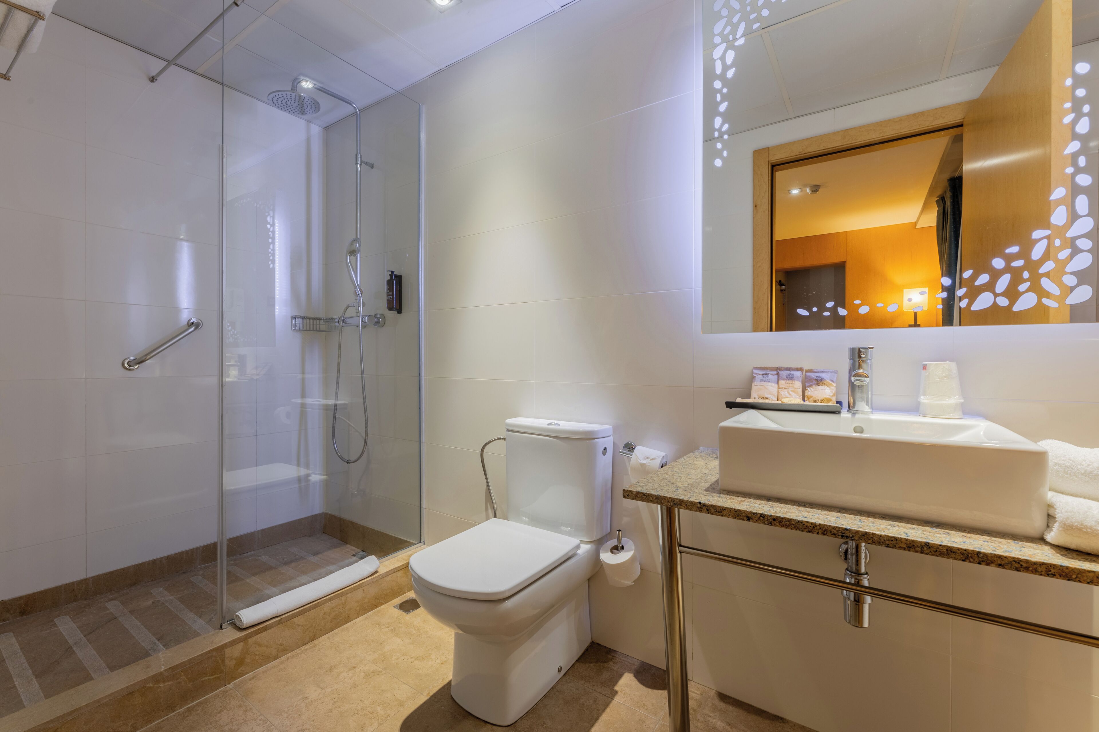 eco-friendly toiletries, hair dryer, towels, soap