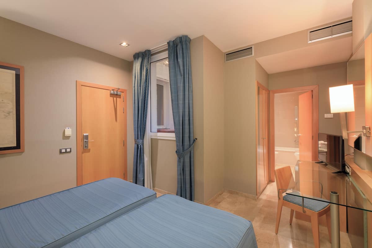 In-room safe, desk, laptop workspace, blackout drapes
