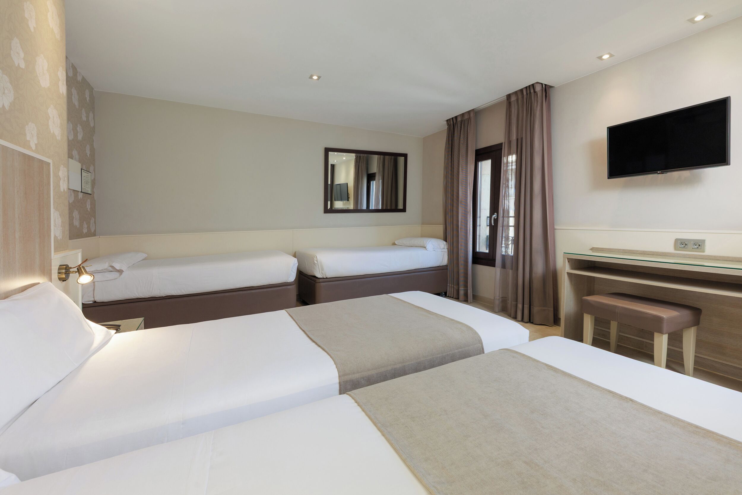 quadruple room | 1 bedroom, down duvets, in-room safe, desk