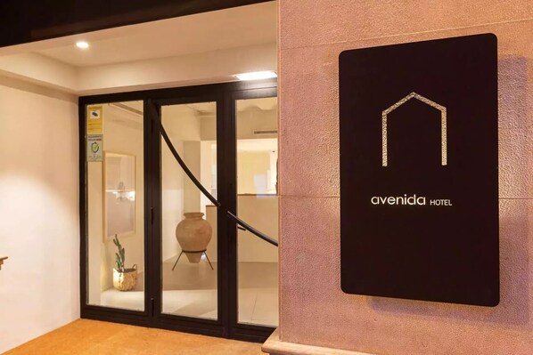 Welcome to Civenida Hotel, where a modern entrance sets the tone for a stylish stay.