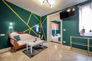 Junior Suite, 2 Bedrooms, Terrace | Living area | Flat-screen TV