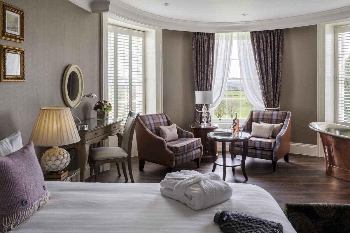 opulent suite | hypo-allergenic bedding, in-room safe, desk, iron/ironing board