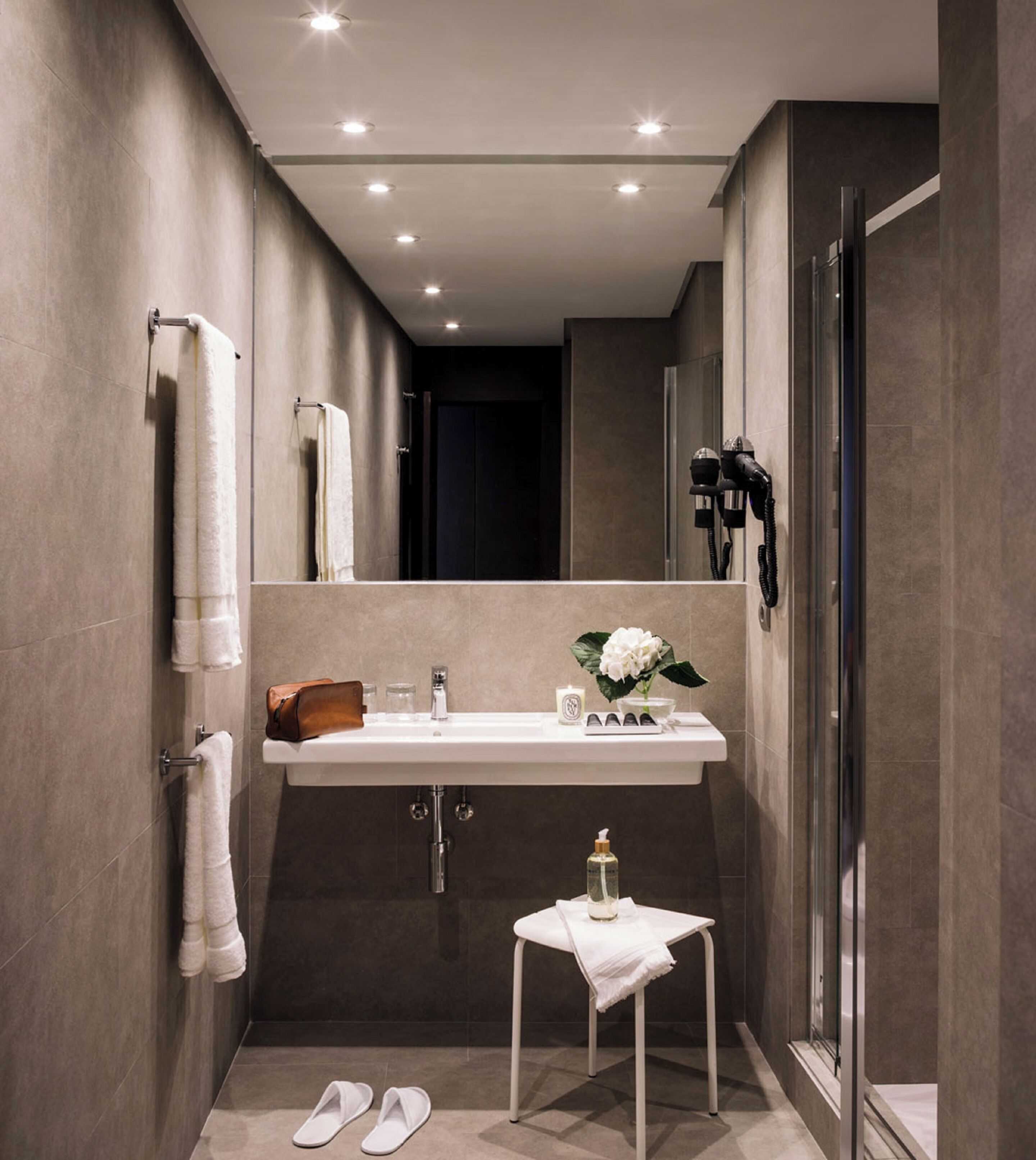 superior room | bathroom | eco-friendly toiletries, hair dryer, towels, soap