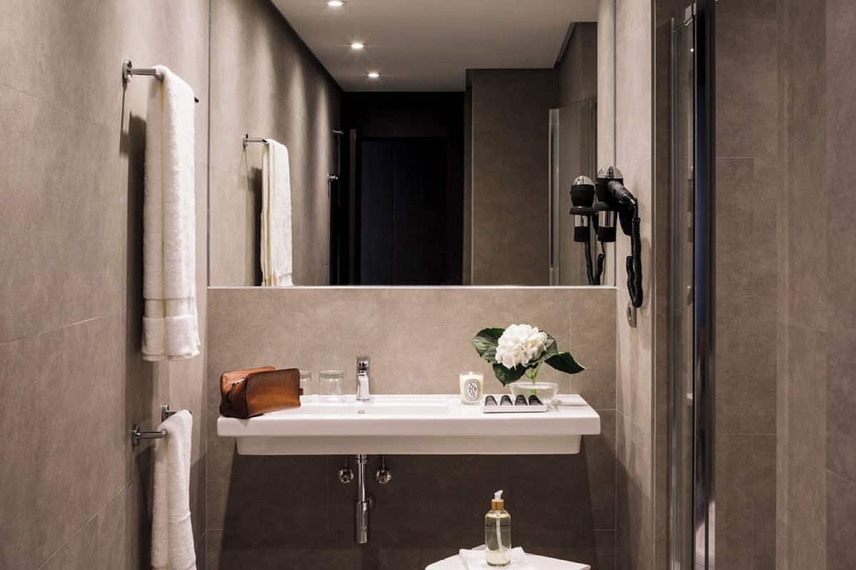 superior room | bathroom | eco-friendly toiletries, hair dryer, towels, soap