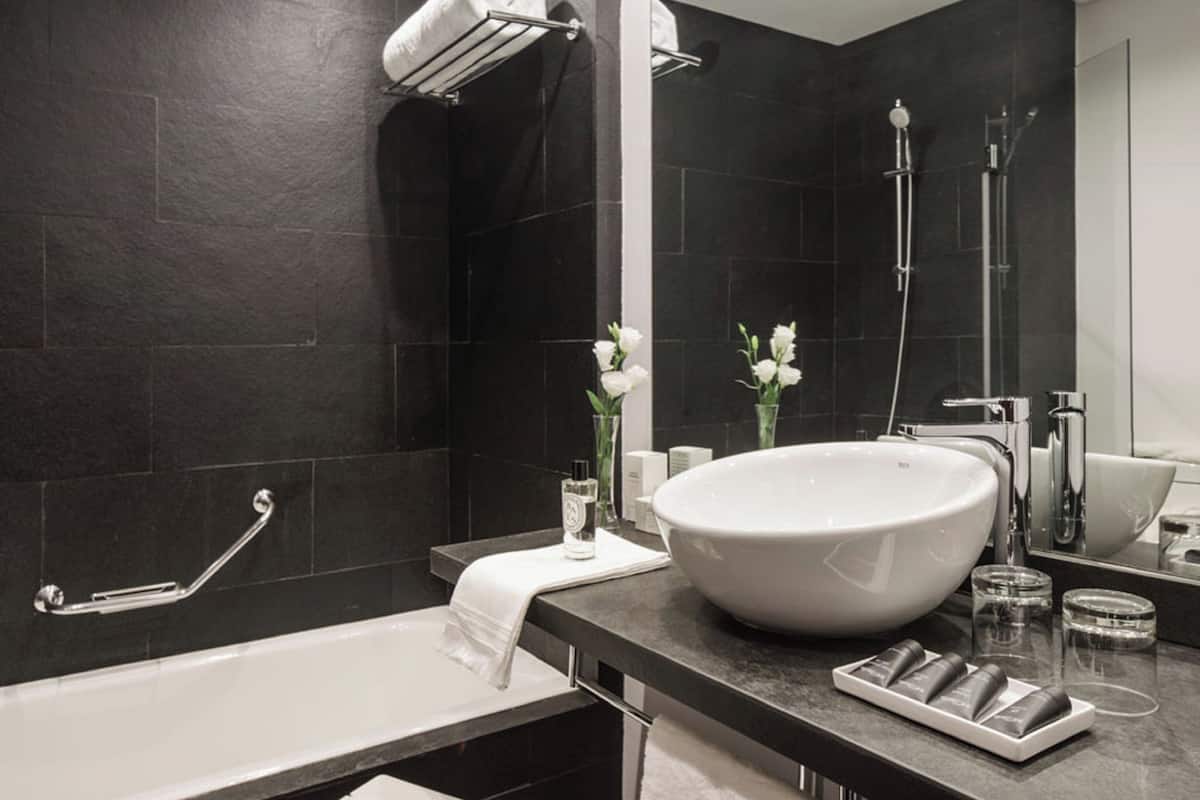 superior room | bathroom | eco-friendly toiletries, hair dryer, towels, soap