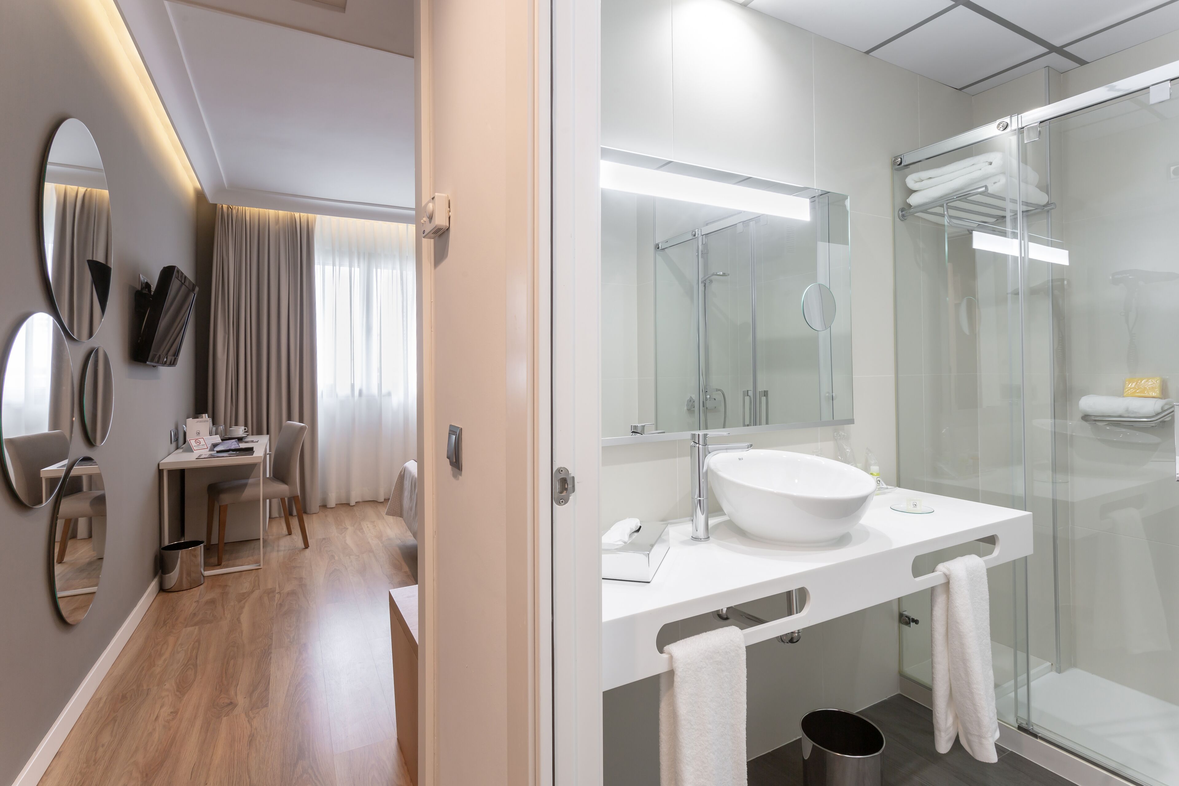 double room single use | bathroom | rainfall showerhead, free toiletries, hair dryer, slippers