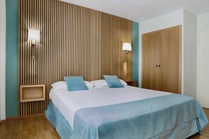 Hypoallergeen beddengoed, een minibar, een kluis op de kamer, een bureau