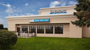 A Baymont Inn & Suites building with a sign for the Indoor Pool & Spa. - Baymont by Wyndham St. Joseph/Stevensville (Stevensville)