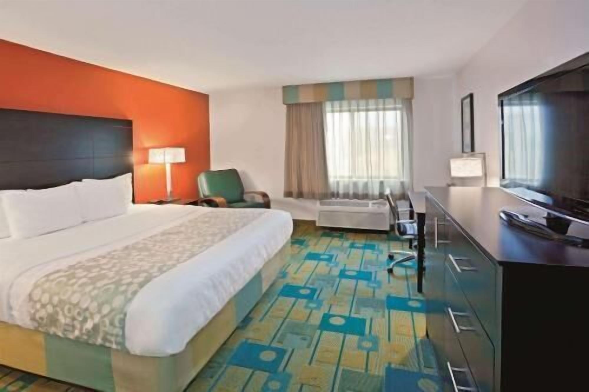 Premium bedding, desk, blackout drapes, iron/ironing board