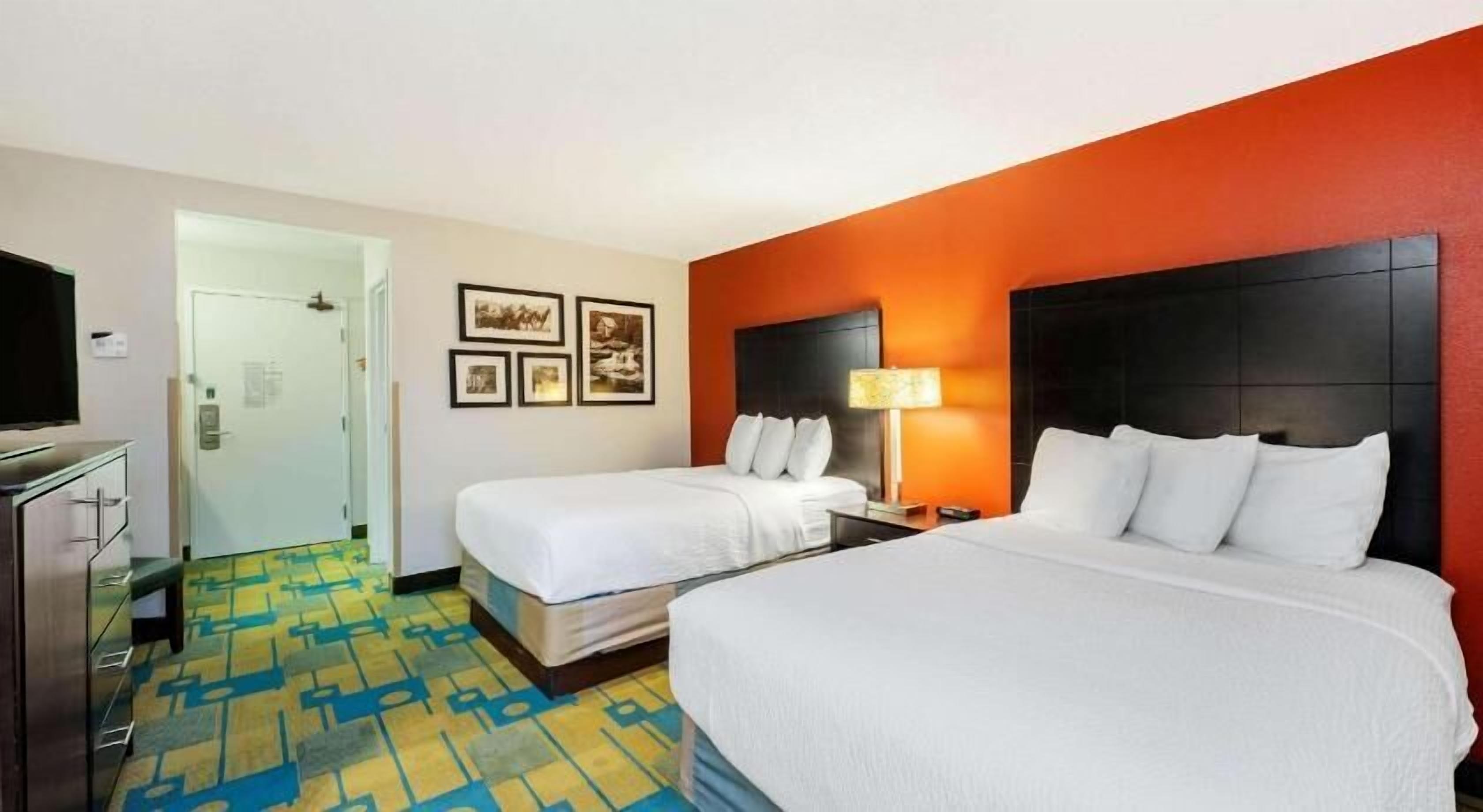 Premium bedding, desk, blackout drapes, iron/ironing board