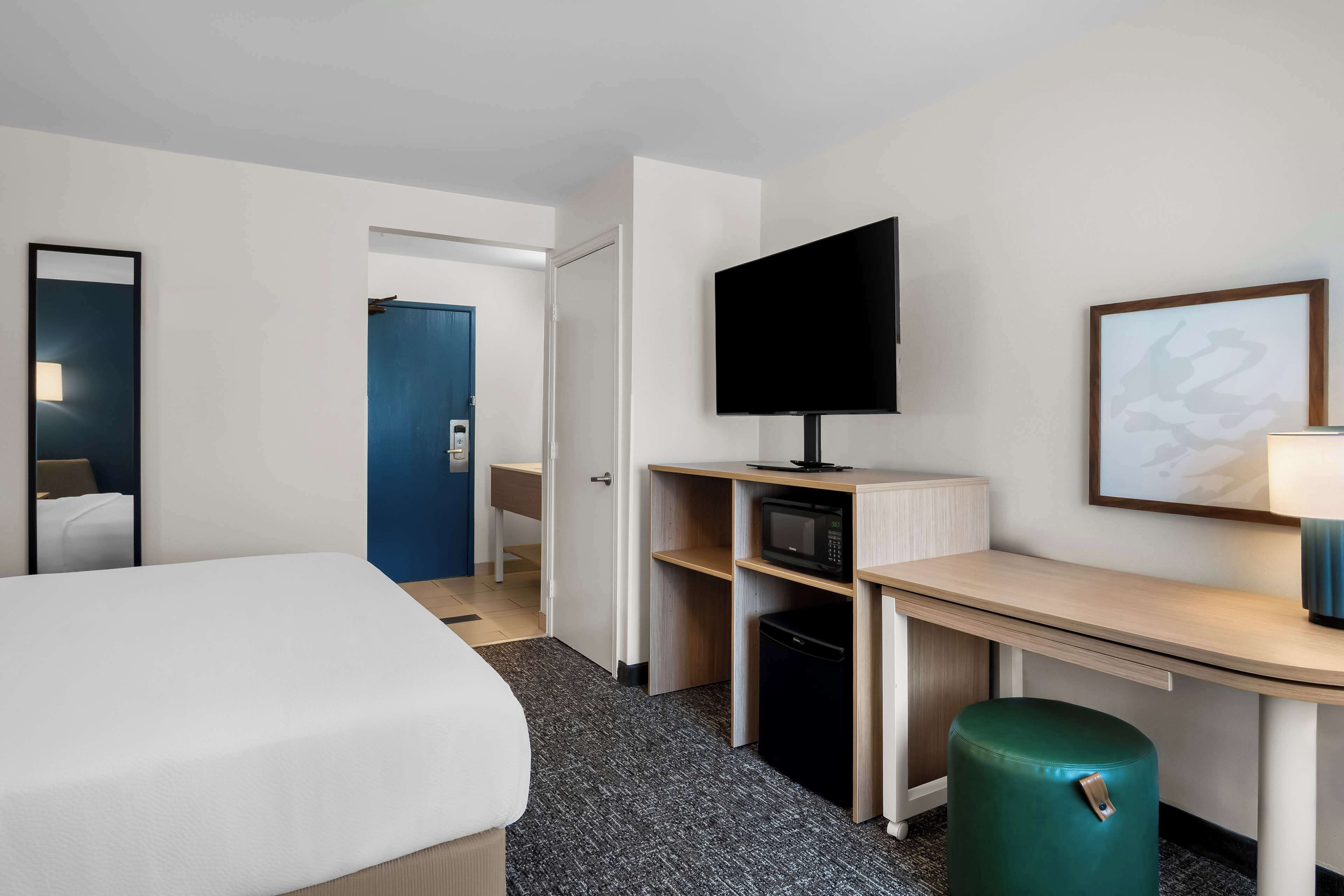 room, 1 king bed | desk, laptop workspace, iron/ironing board, free rollaway beds