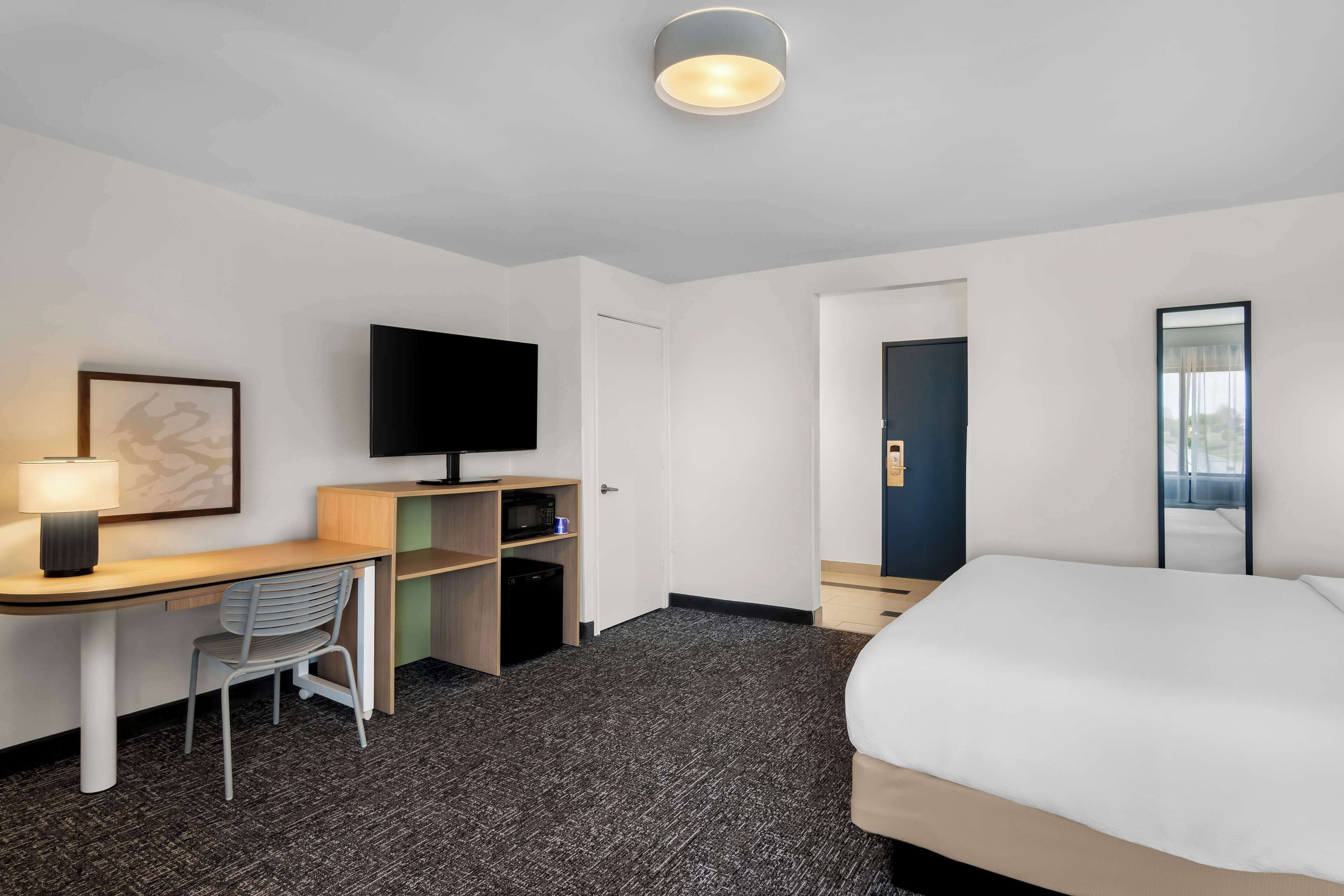 room, 1 king bed with sofa bed | desk, laptop workspace, iron/ironing board, free rollaway beds