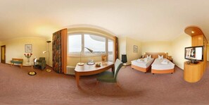 Hypo-allergenic bedding, minibar, desk, blackout curtains