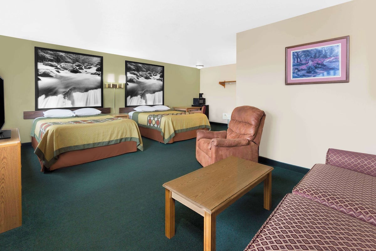 Suite, 2 Queen Beds | In-room safe, desk, iron/ironing board, free cribs/infant beds