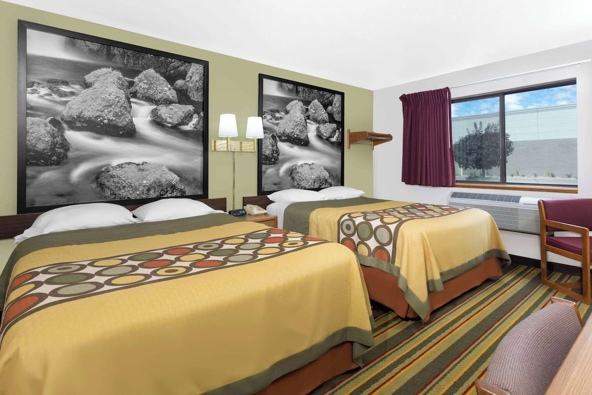 Standard Room, 2 Queen Beds | In-room safe, desk, iron/ironing board, free cribs/infant beds