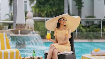 2 outdoor pools, open 8:00 AM to 7:30 PM, pool umbrellas, sun loungers