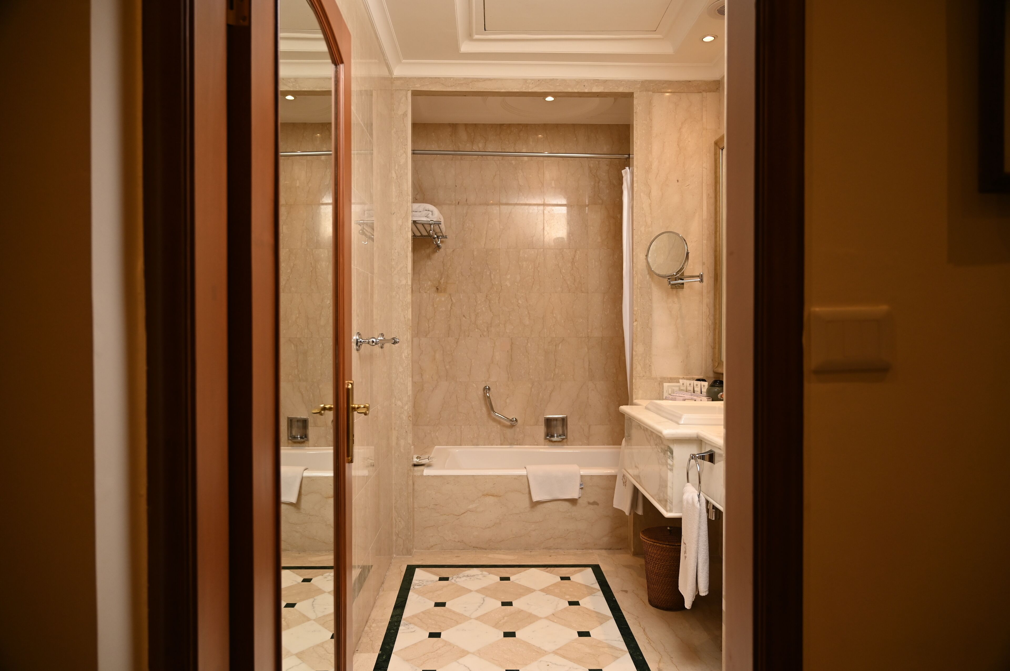 combined shower/bathtub, deep-soaking bathtub, designer toiletries