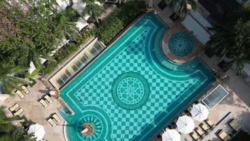 2 outdoor pools, open 8:00 AM to 7:30 PM, pool umbrellas, pool loungers