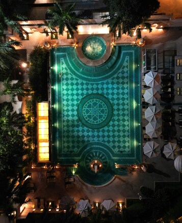 2 outdoor pools, open 8:00 AM to 7:30 PM, pool umbrellas, pool loungers