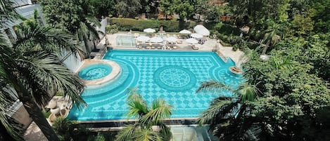 2 outdoor pools, open 8:00 AM to 7:30 PM, pool umbrellas, sun loungers