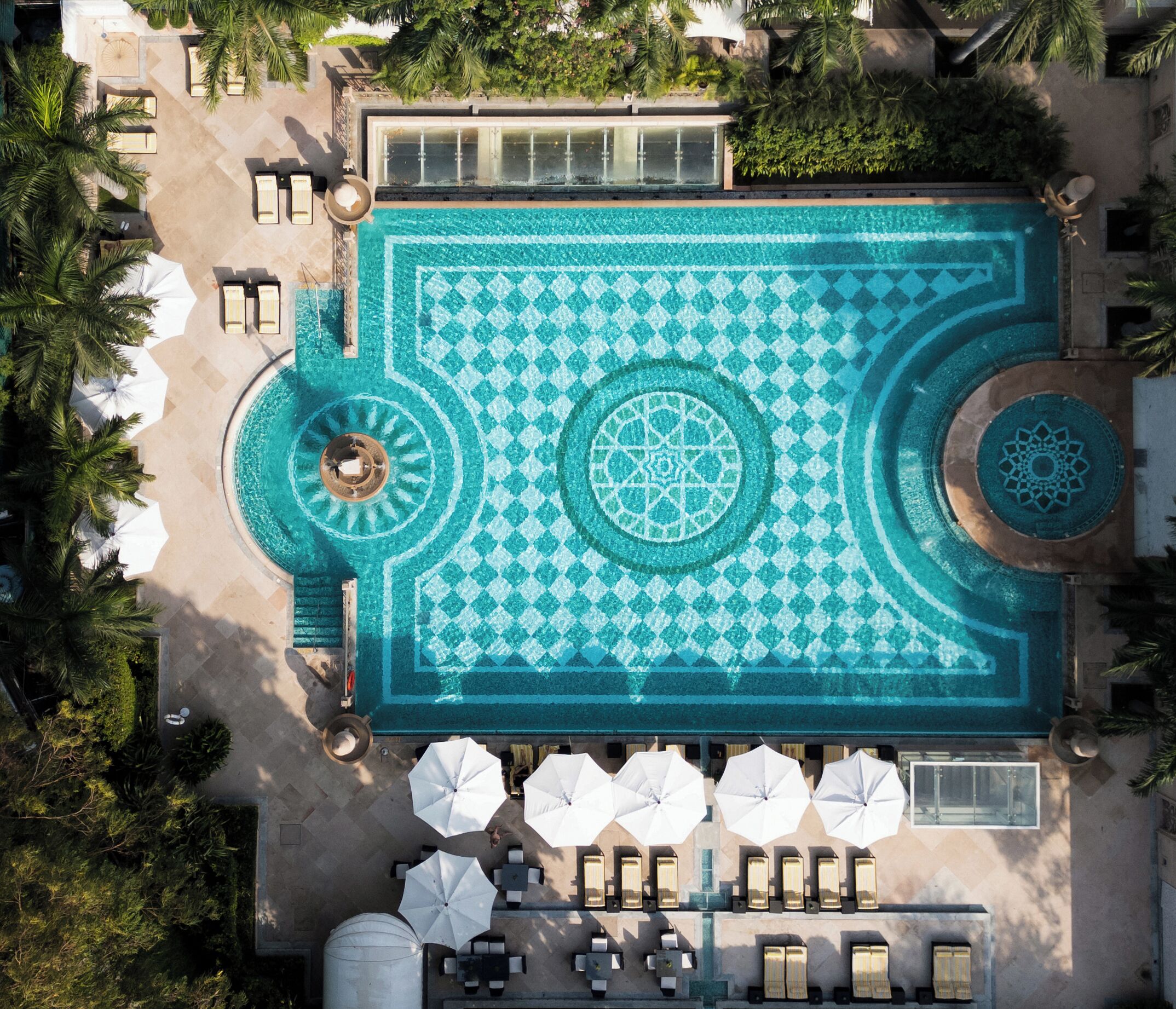 2 outdoor pools, open 8:00 AM to 7:30 PM, pool umbrellas, pool loungers