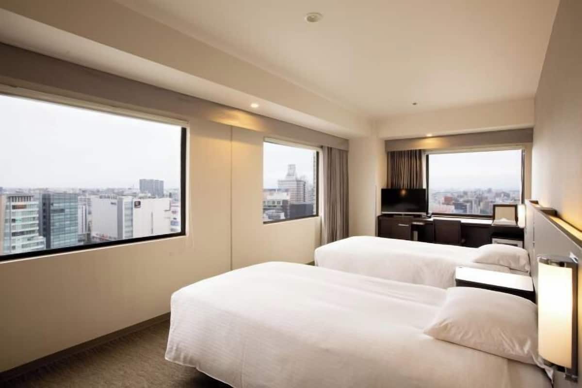 Premium bedding, minibar, desk, laptop workspace