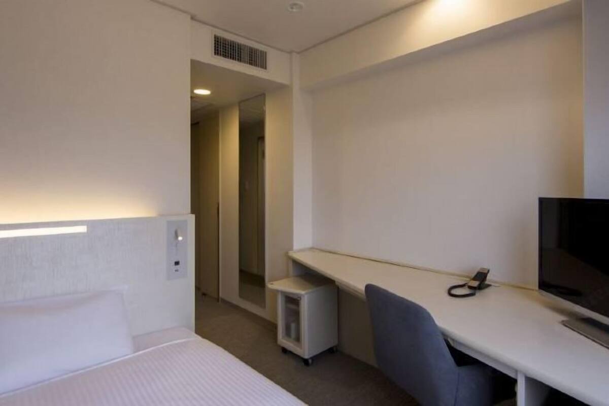 Premium bedding, minibar, desk, laptop workspace