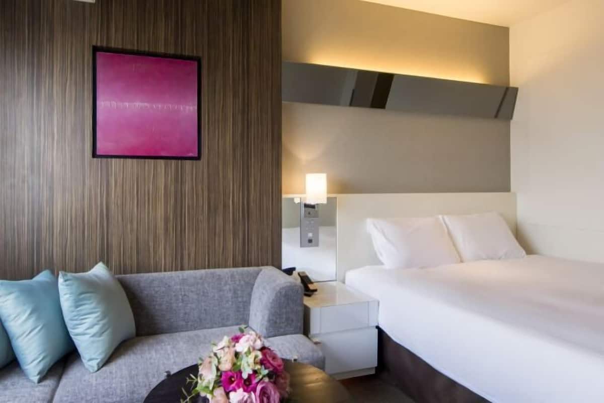 Premium bedding, minibar, desk, laptop workspace