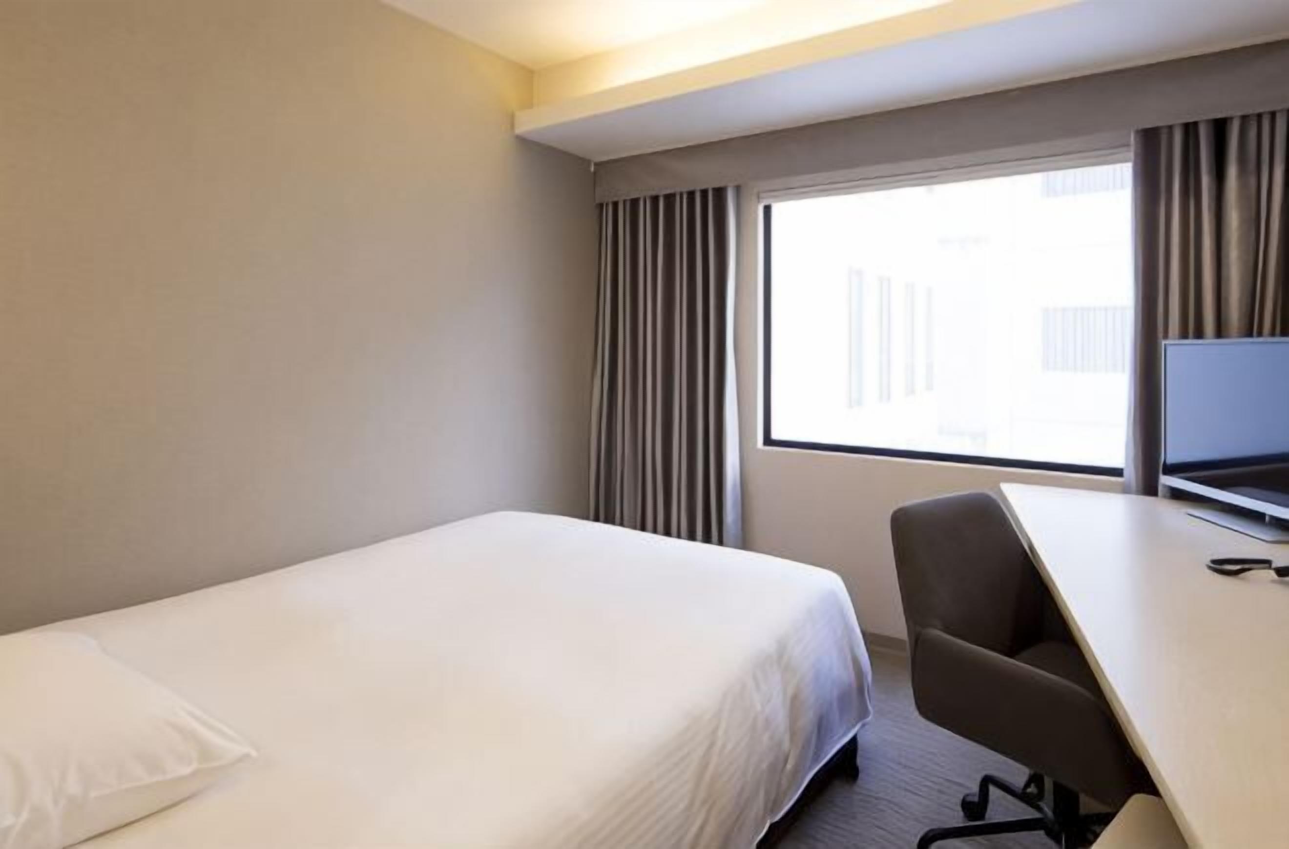 Premium bedding, minibar, desk, laptop workspace