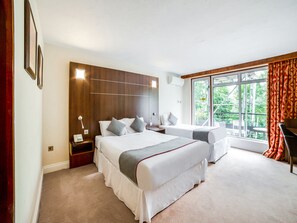 Chambre Triple Deluxe | 1 chambre, bureau, fer et planche à repasser, Wi-Fi gratuit