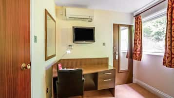 Standard Single Room, 1 Single Bed | Living area | 32-inch flat-screen TV with digital channels