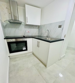 Apartamento, 1 quarto | Cozinha americana privada | Chaleira elétrica