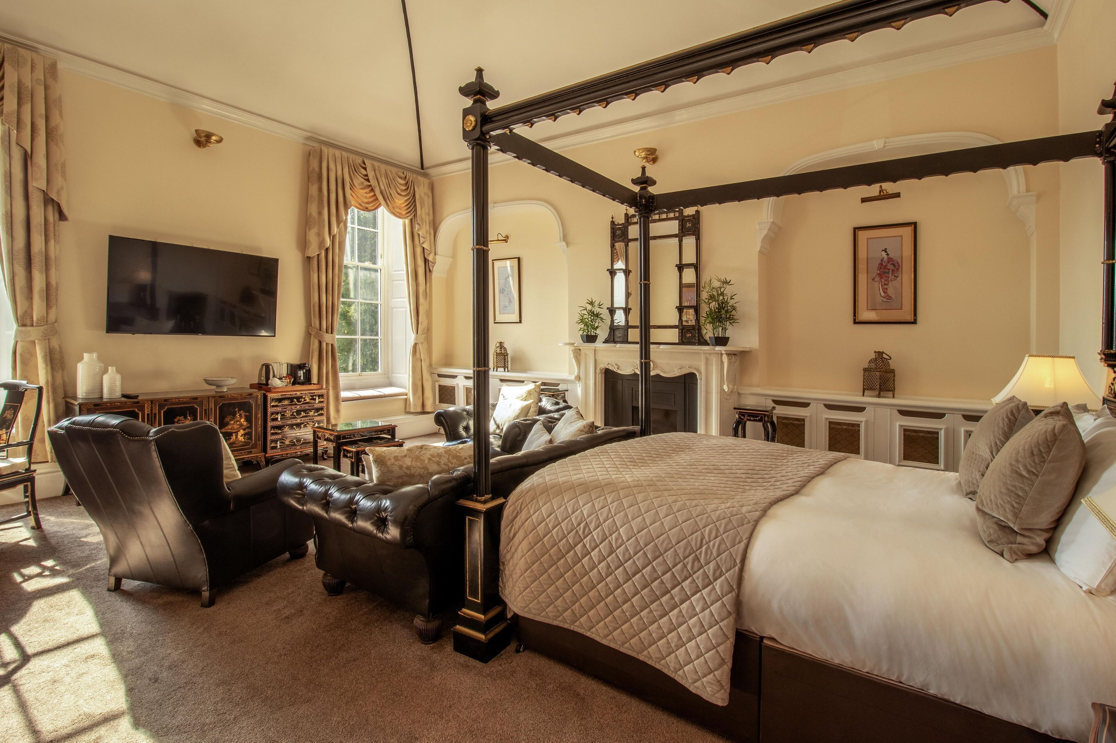 Suite | Individually decorated, desk, laptop workspace, iron/ironing board