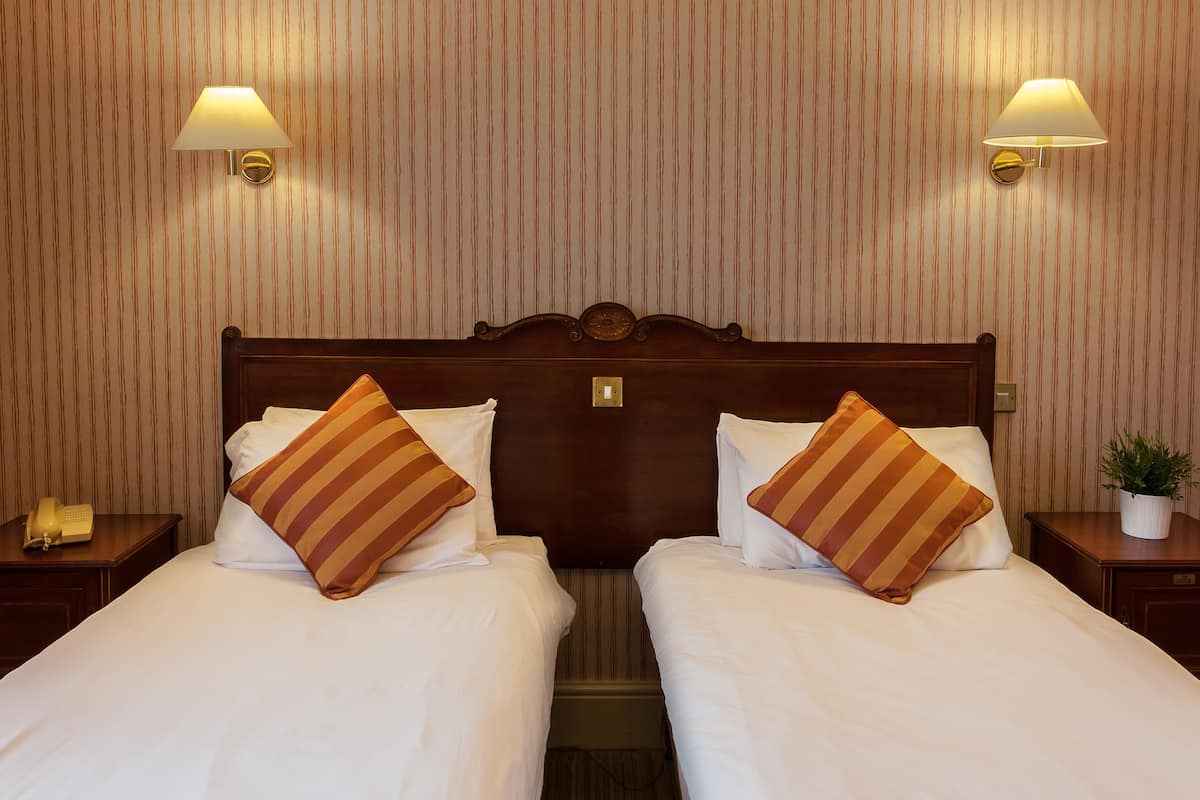 Individually decorated, desk, laptop workspace, iron/ironing board