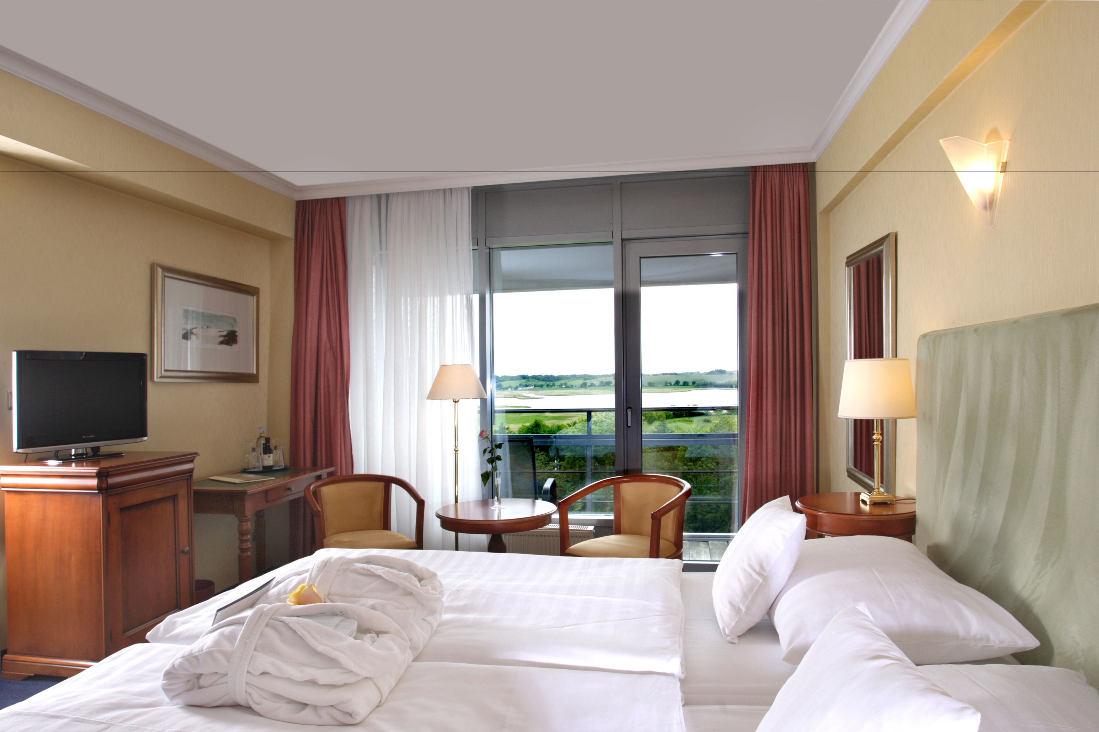 double room | egyptian cotton sheets, down duvets, pillow-top beds, minibar