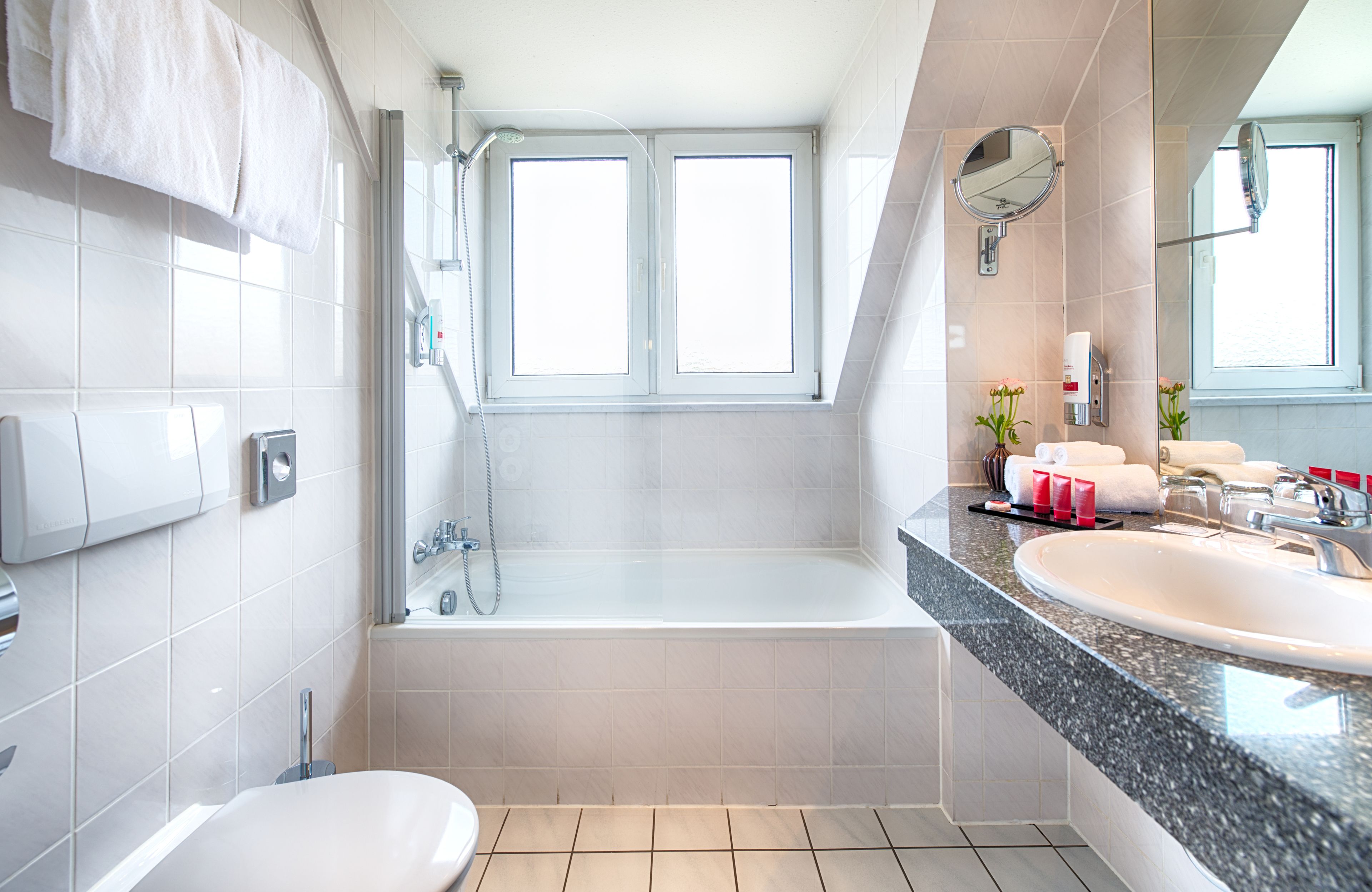 junior suite | bathroom | hair dryer, towels