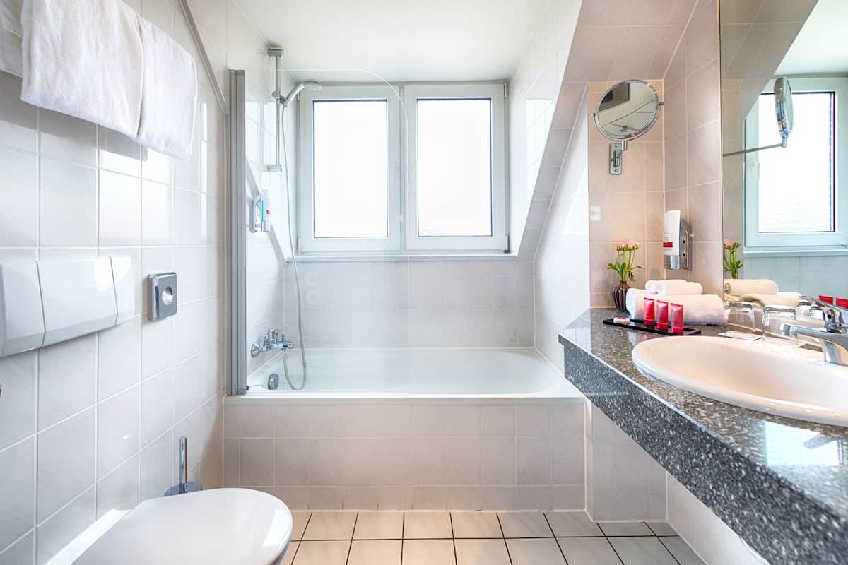 junior suite | bathroom | hair dryer, towels