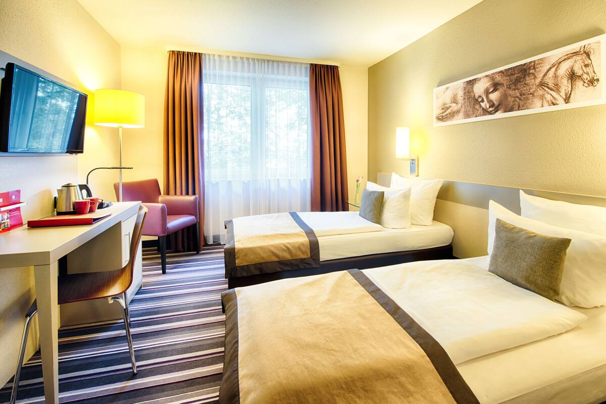 In-room safe, desk, cribs (free), WiFi (free)