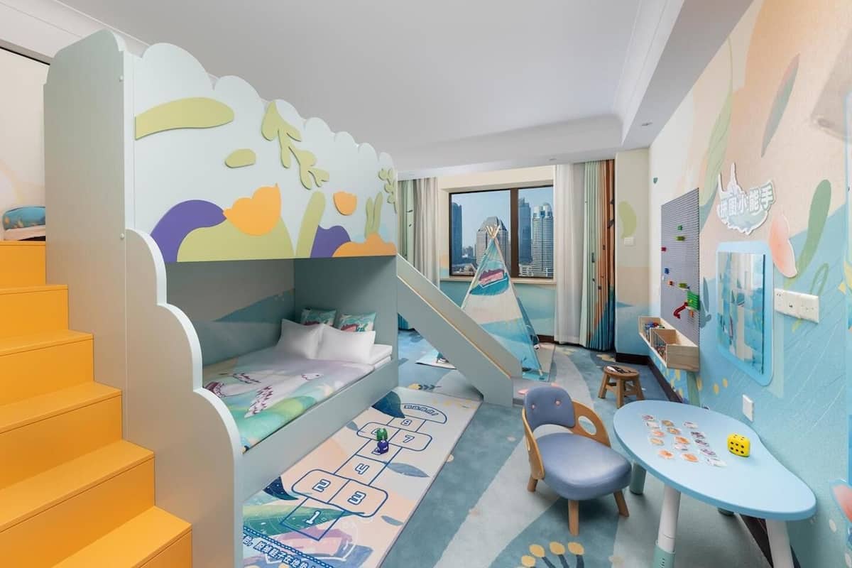 Family Quadruple Room, Multiple Beds | Minibar, in-room safe, desk, blackout drapes