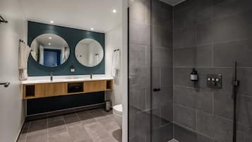 Junior Suite, Patio | Bathroom | Eco-friendly toiletries, hair dryer, towels