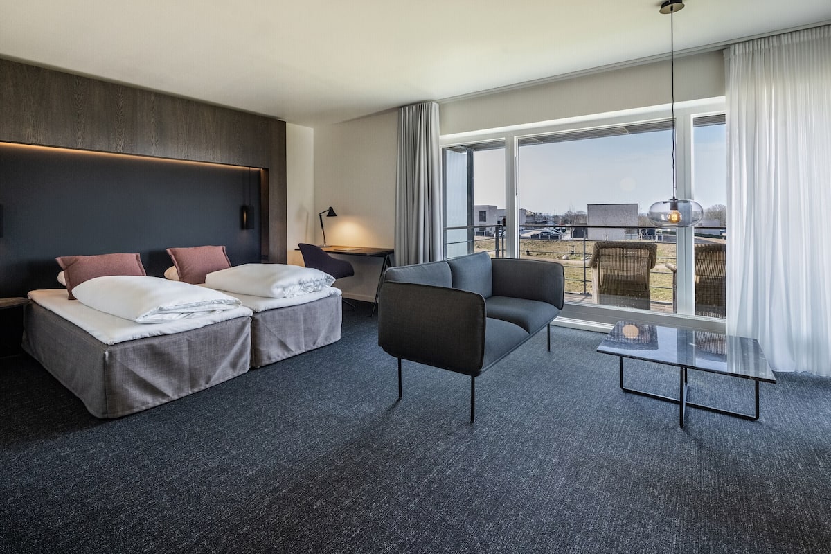 junior suite, patio | 1 bedroom, premium bedding, desk, blackout curtains