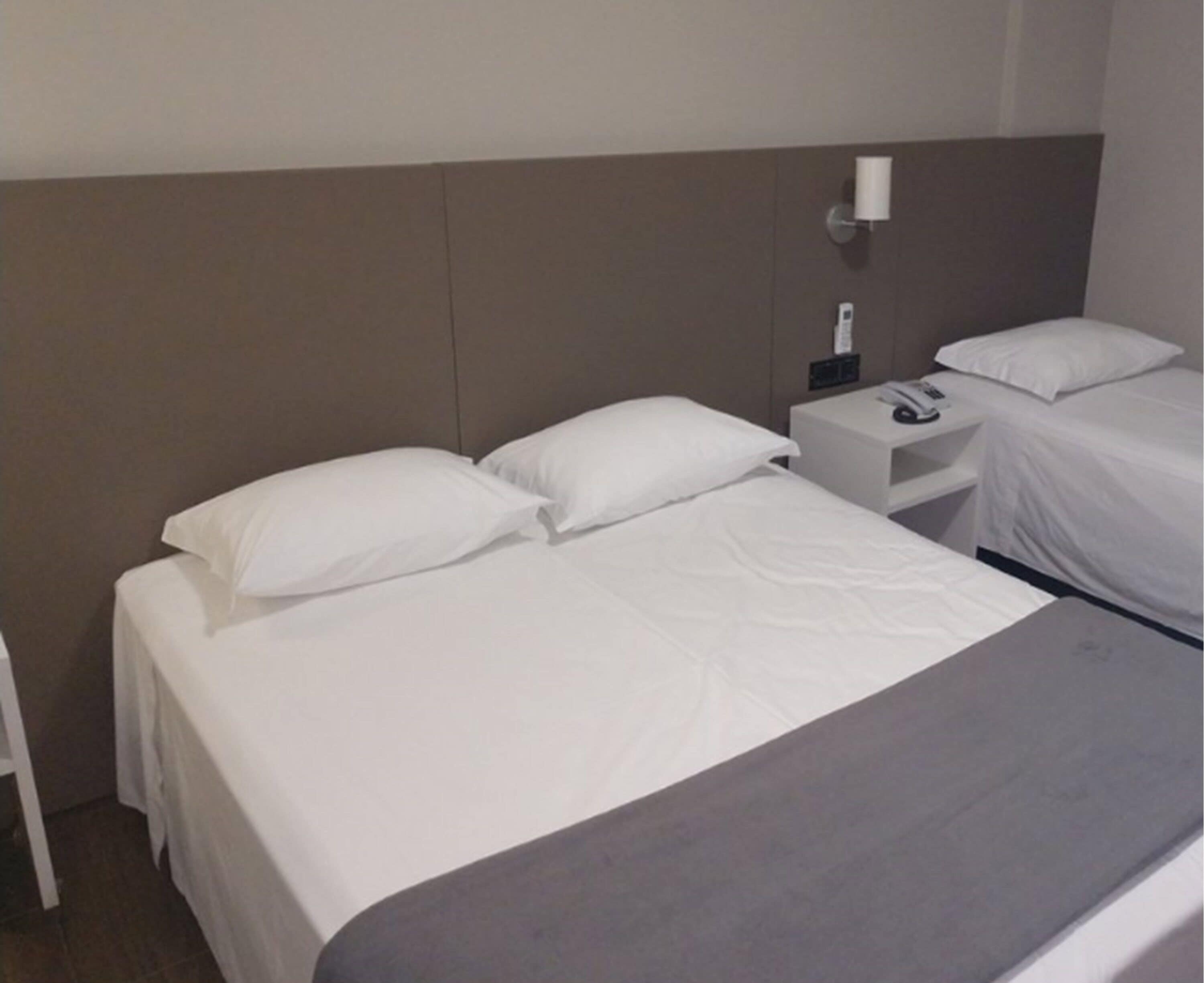 luxury triple room | premium bedding, minibar, in-room safe, desk