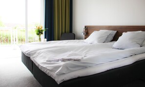 1 dormitorio y ropa de cama de alta calidad