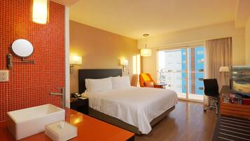 Deluxe Room, 1 King Bed | In-room safe, desk, iron/ironing board, free WiFi
