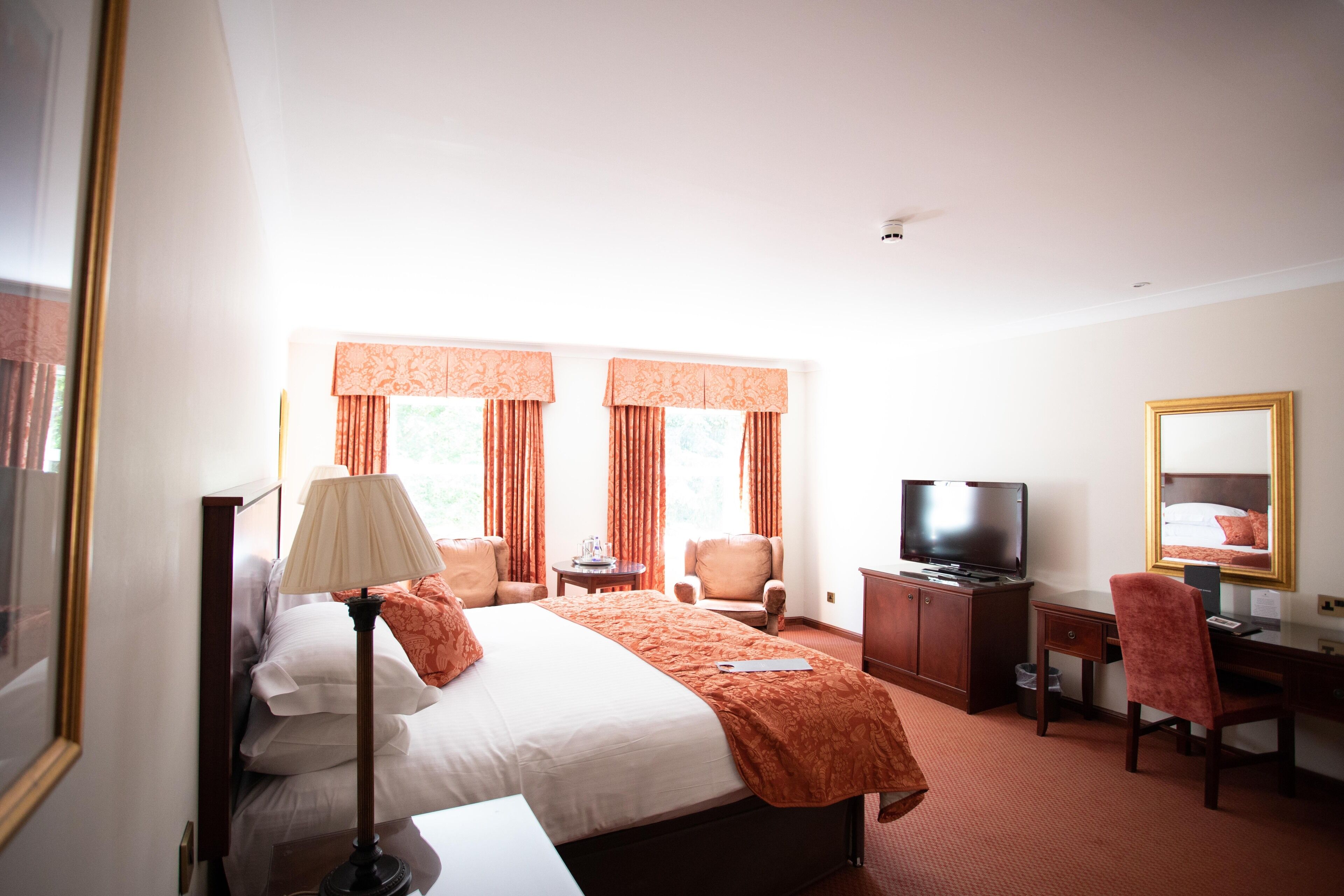 deluxe room, 1 double bed (deluxe double) | premium bedding, in-room safe, blackout curtains, iron/ironing board